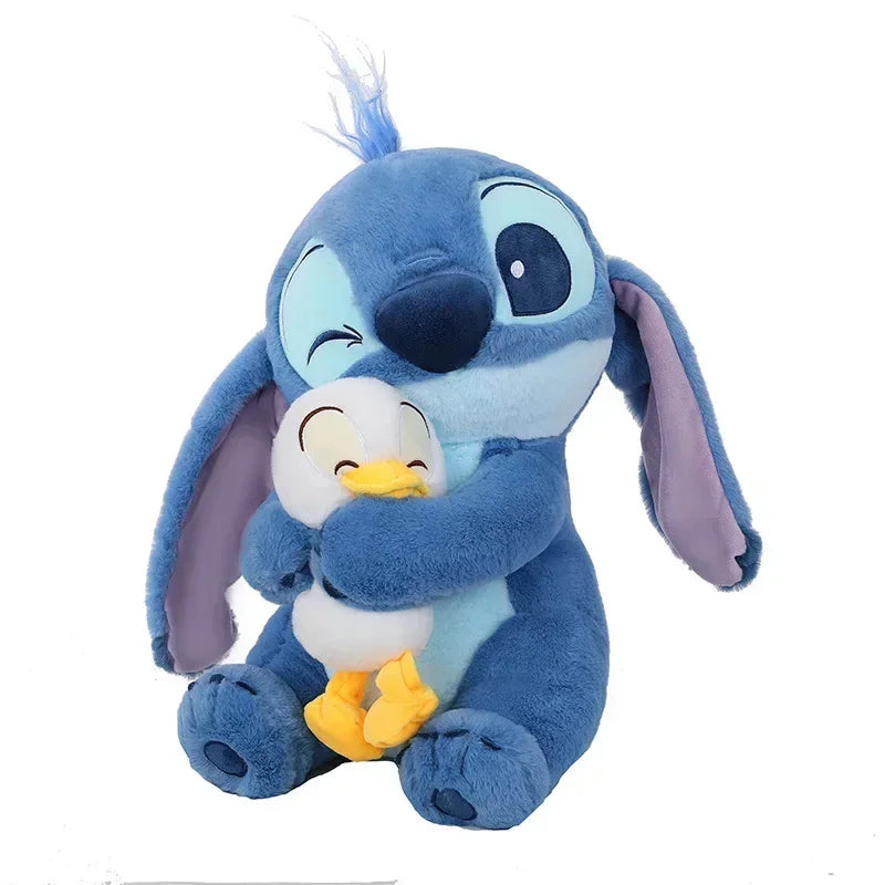 Soft cuddly blue hugging plush toy with a little duck companion, a sweet gift for kids who love plush toys