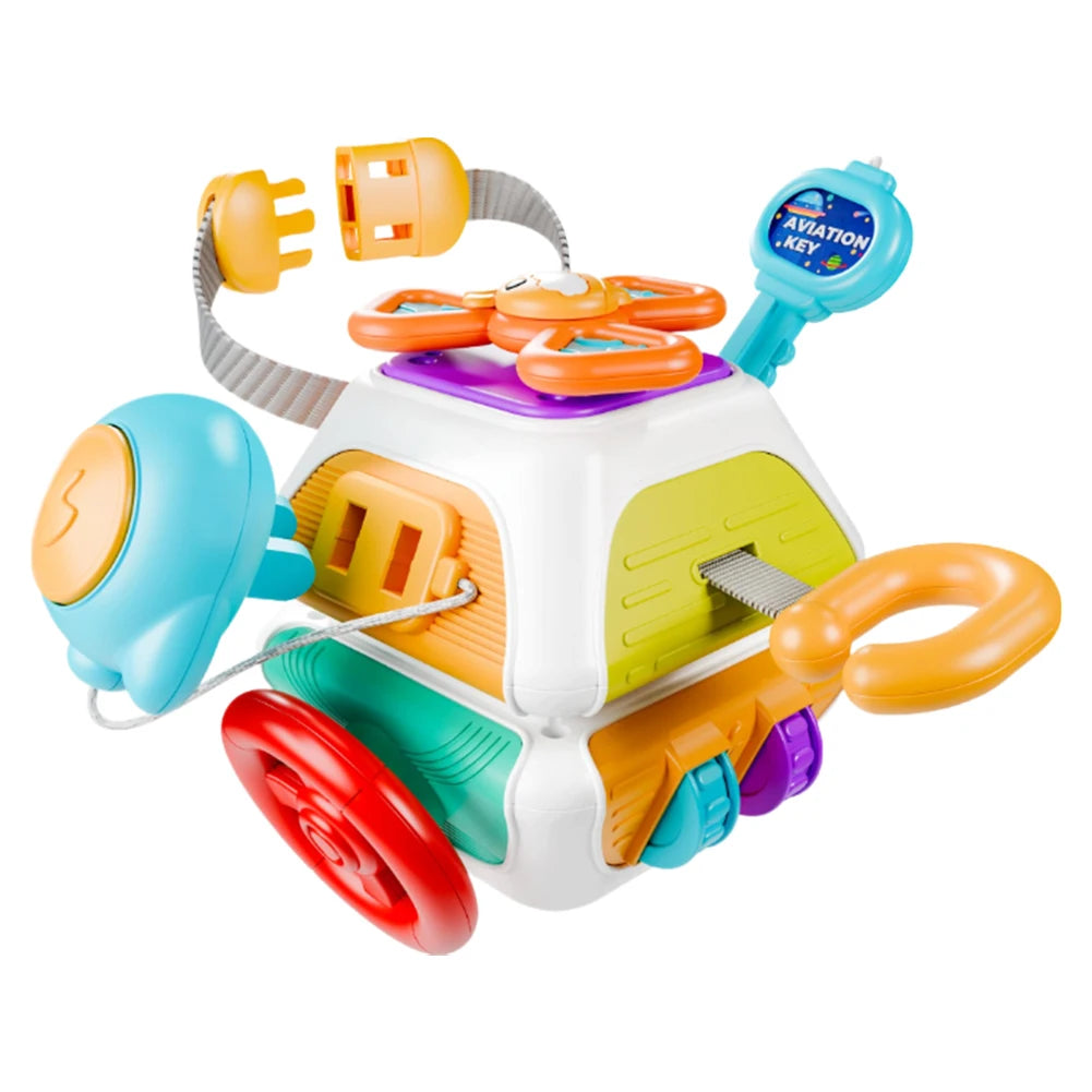 10-sided Montessori busy cube with buttons, gears and tactile fidgets for toddlers building fine motor skills