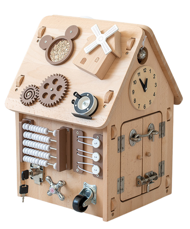 Beech wood busy board house in neutral tones with latches, gears and activities for toddler fine motor play